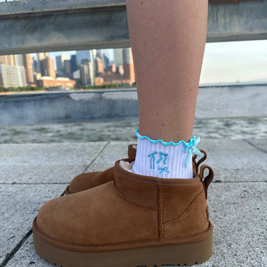 Blue bow grip socks