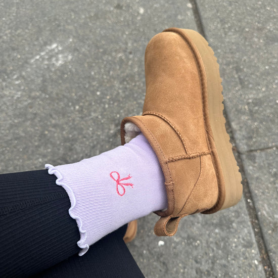 Custom embroidered ruffle grips